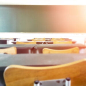 School,classroom,in,blur,background,without,young,student;,blurry,view