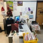 Desk With Crucifix On Wall